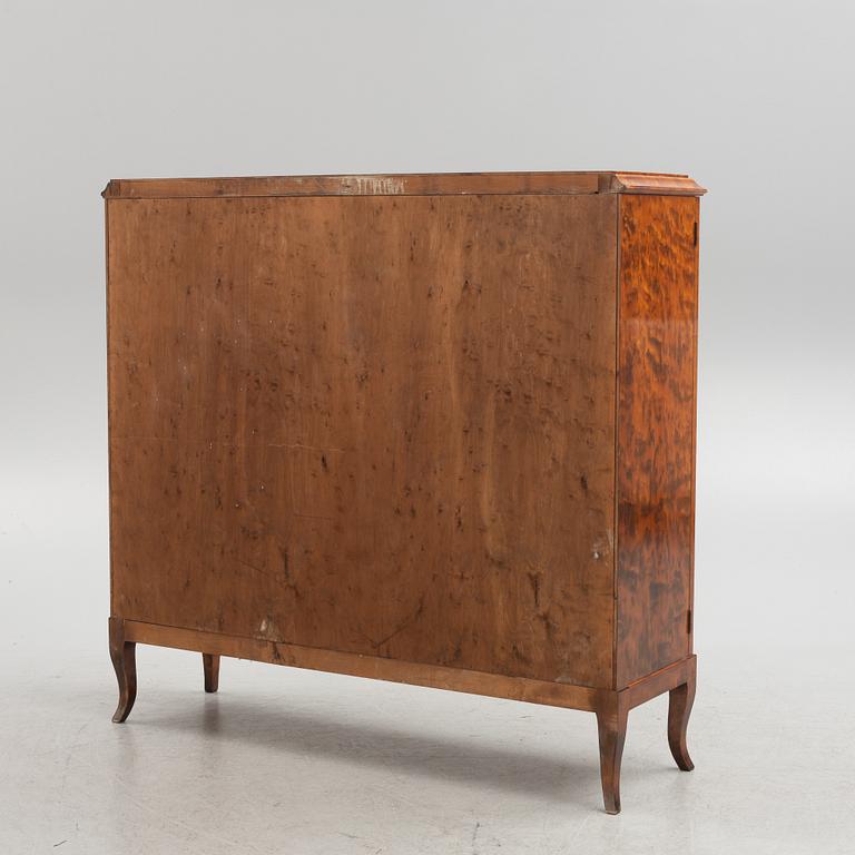 A birch wood veneered cabinet, 1920s.