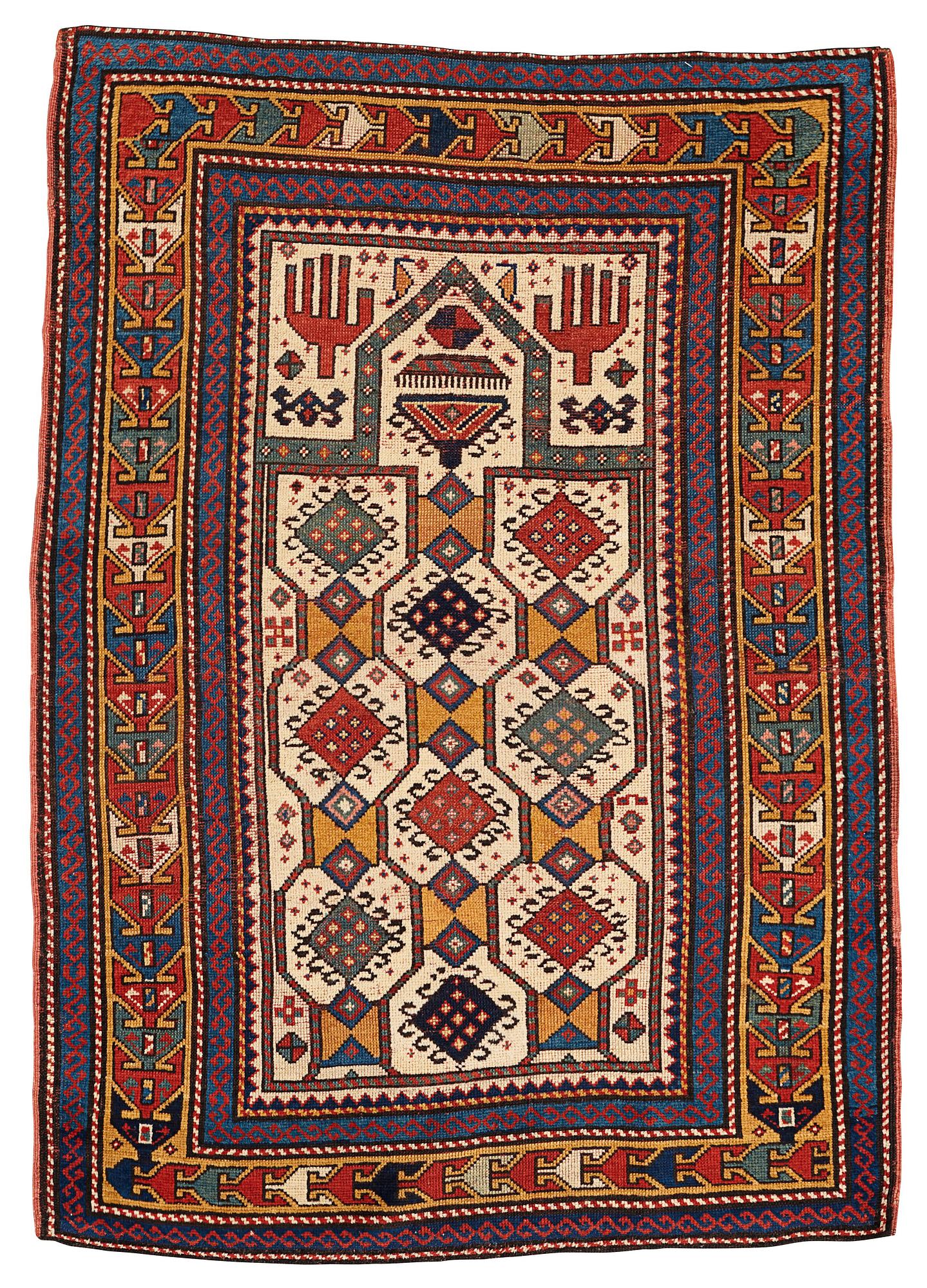 A RUG, an antique Caucasian prayer rug, Czar Russia, ca 144-151 x 103-106 cm.