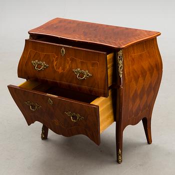 A chest of drawers, mid-20th Century.