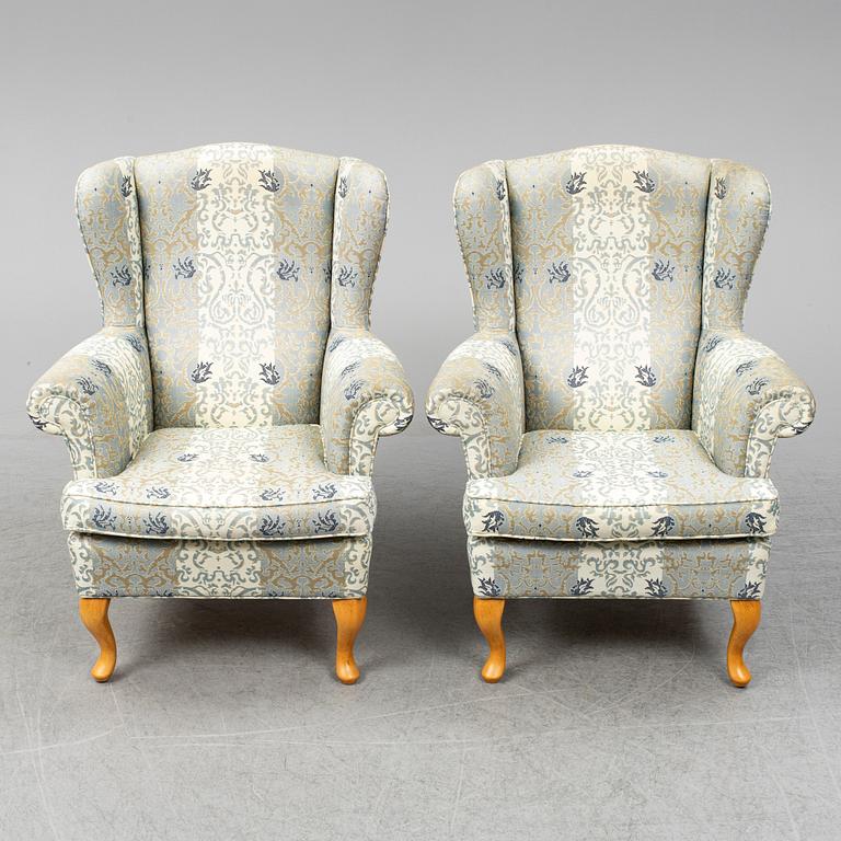 A pair of late 20th century easy chairs.