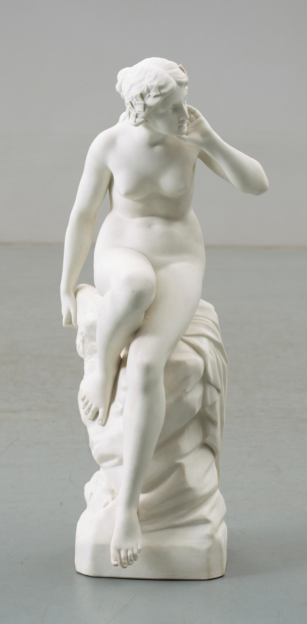 FIGURIN, parian, Gustavsberg. Sign G E. Daterad 1919.