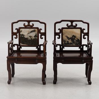 A pair of hardwood chairs and a table, China, 20th century.