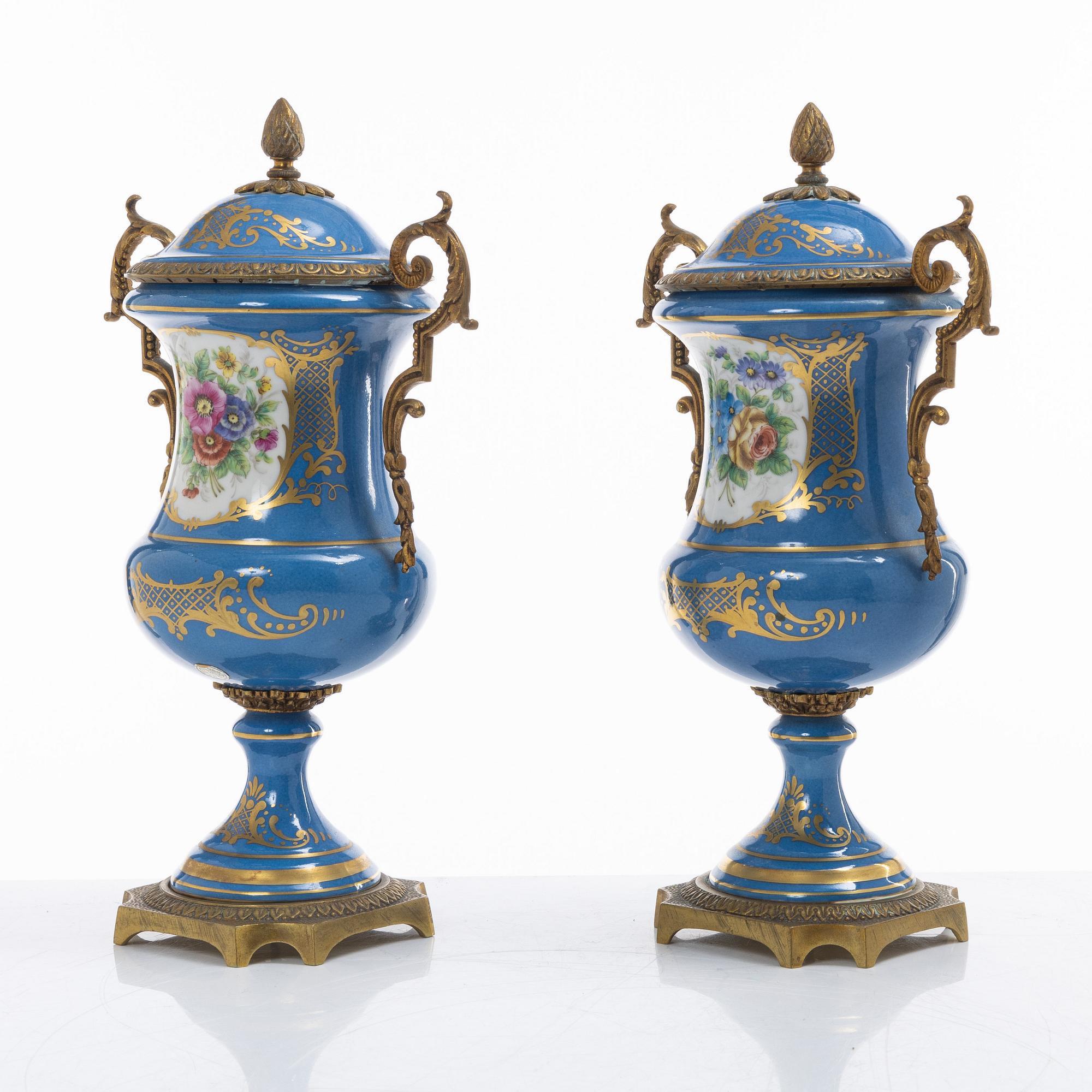 Decorative urns, a pair, porcelain, Sevres-like mark, circa 1900.