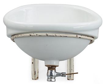 572. An Alvar Aalto molded porcelain wash basin for the Paimio Sanatorium, Arabia, Finland 1930's.