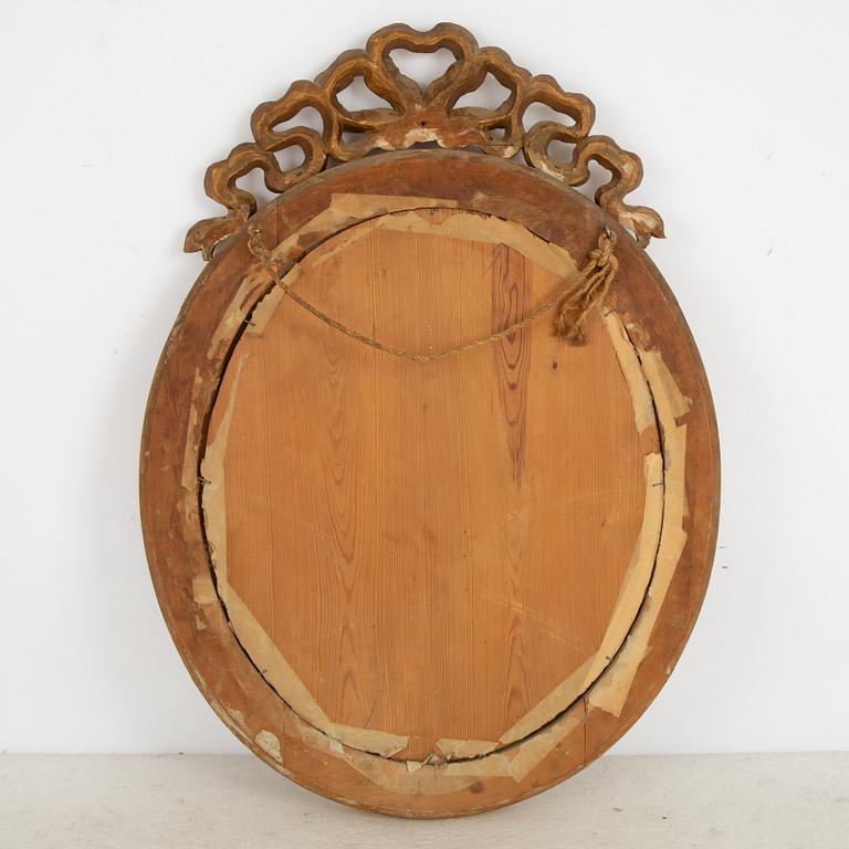 A Gustavian style mirror, early 20th Century.