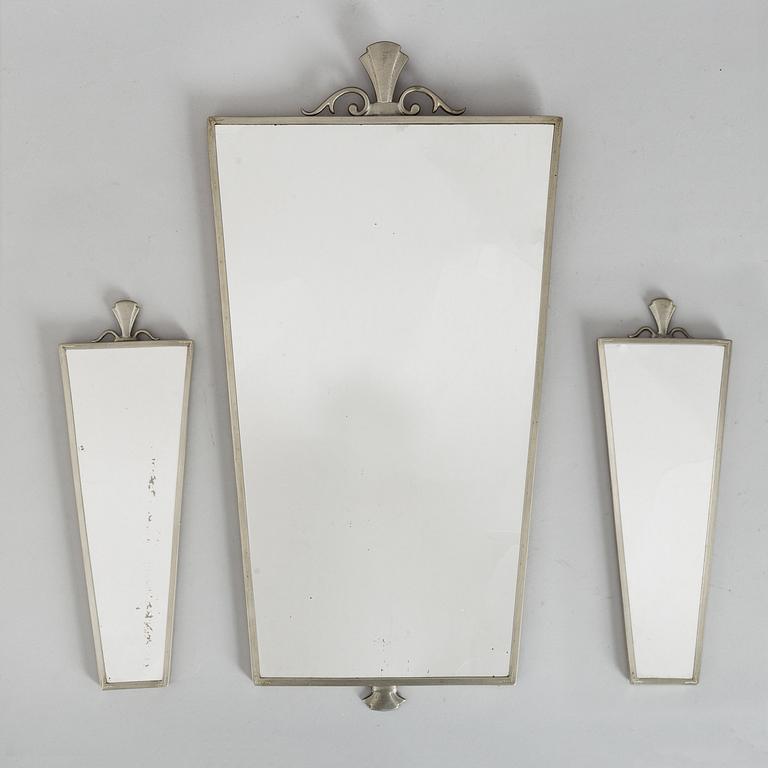 A 1930's mirror and a pair of sconces.