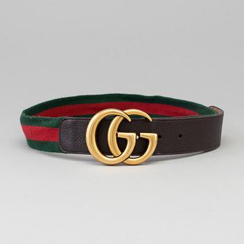 A canvas belt by Gucci.