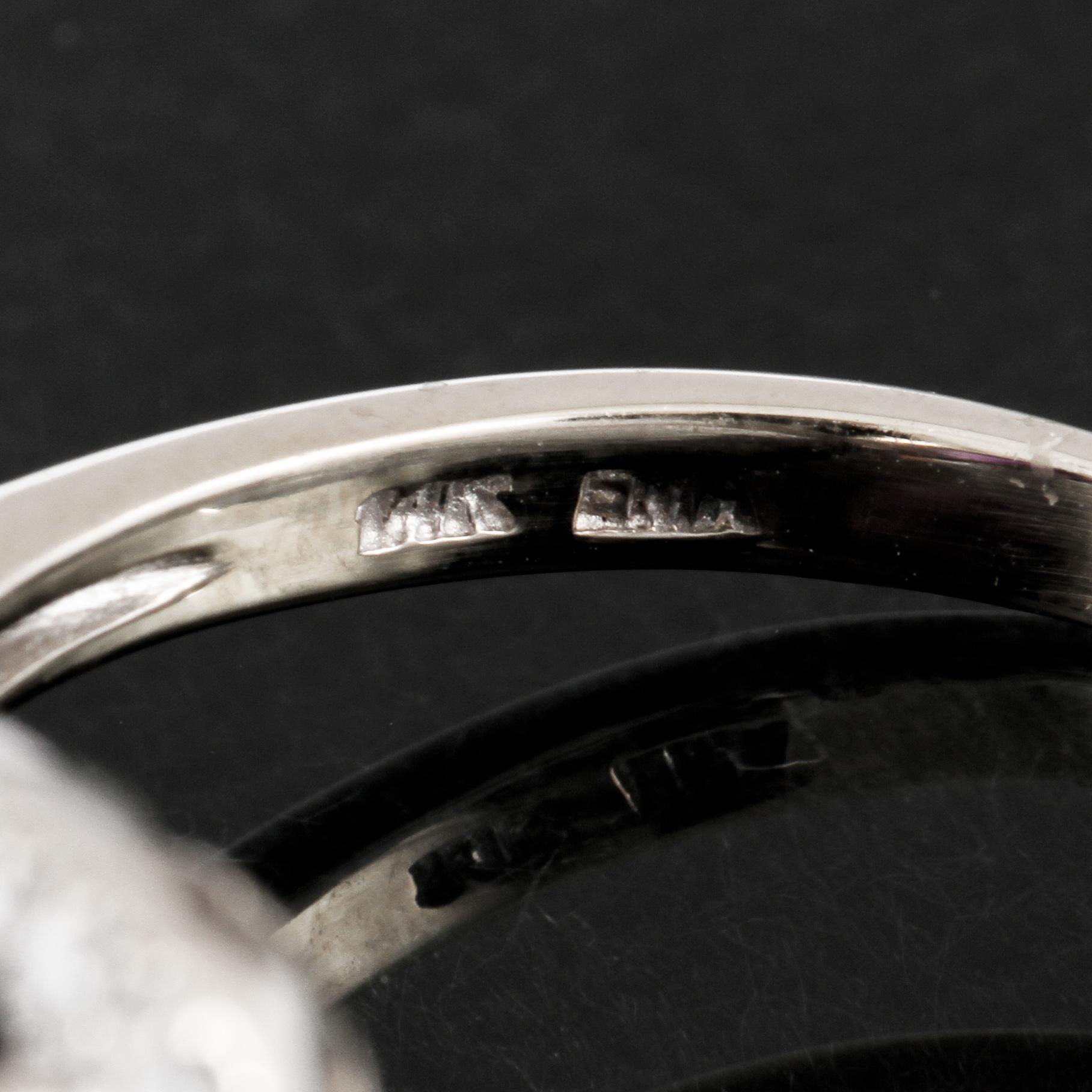 RING, 14K vitguld med checkerslipad ametist samt små briljantslipade diamanter. Vikt 3,6 g.