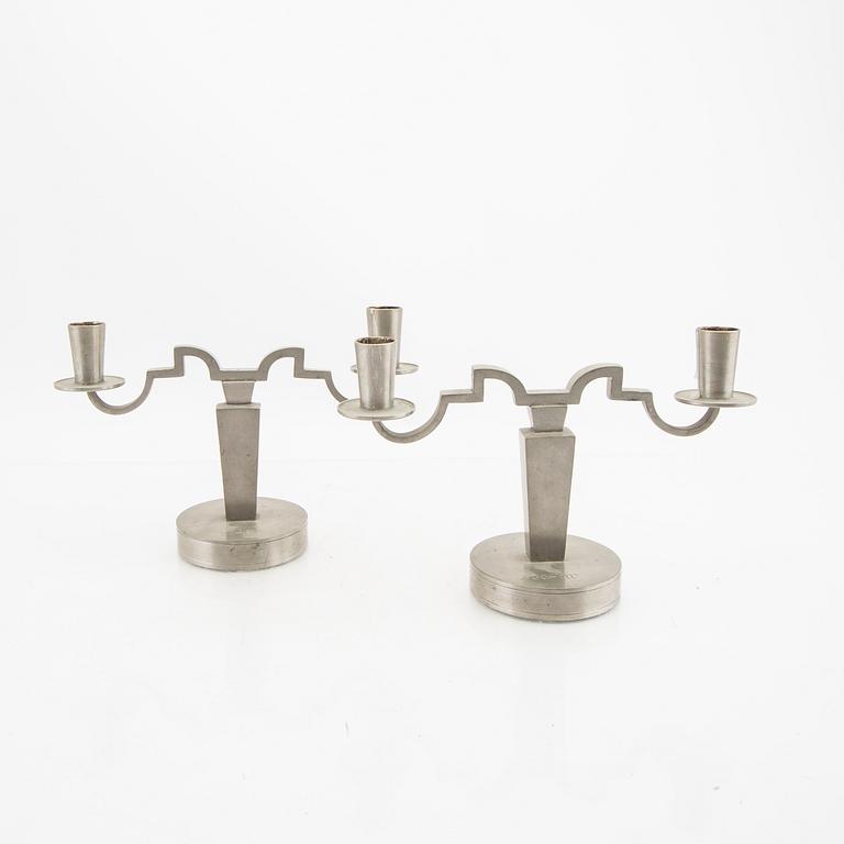 A pair of Firma Svenskt Tenn pewter candelabras 1933.