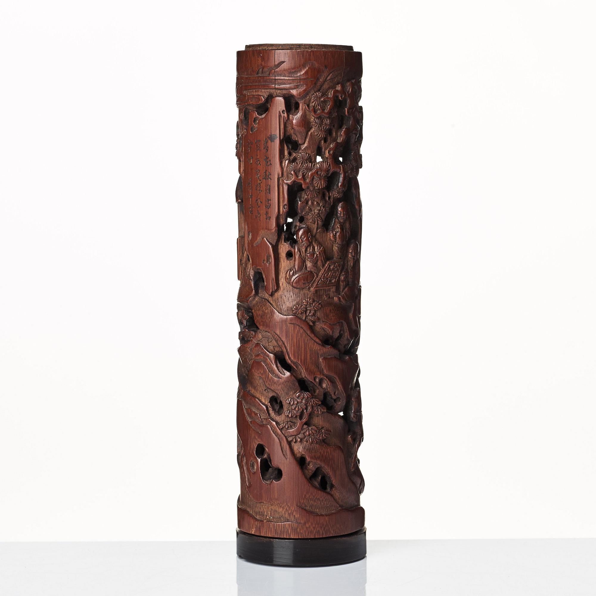 A carved cylindrical bambo parfumier, Qing dynasty, 19th Century.