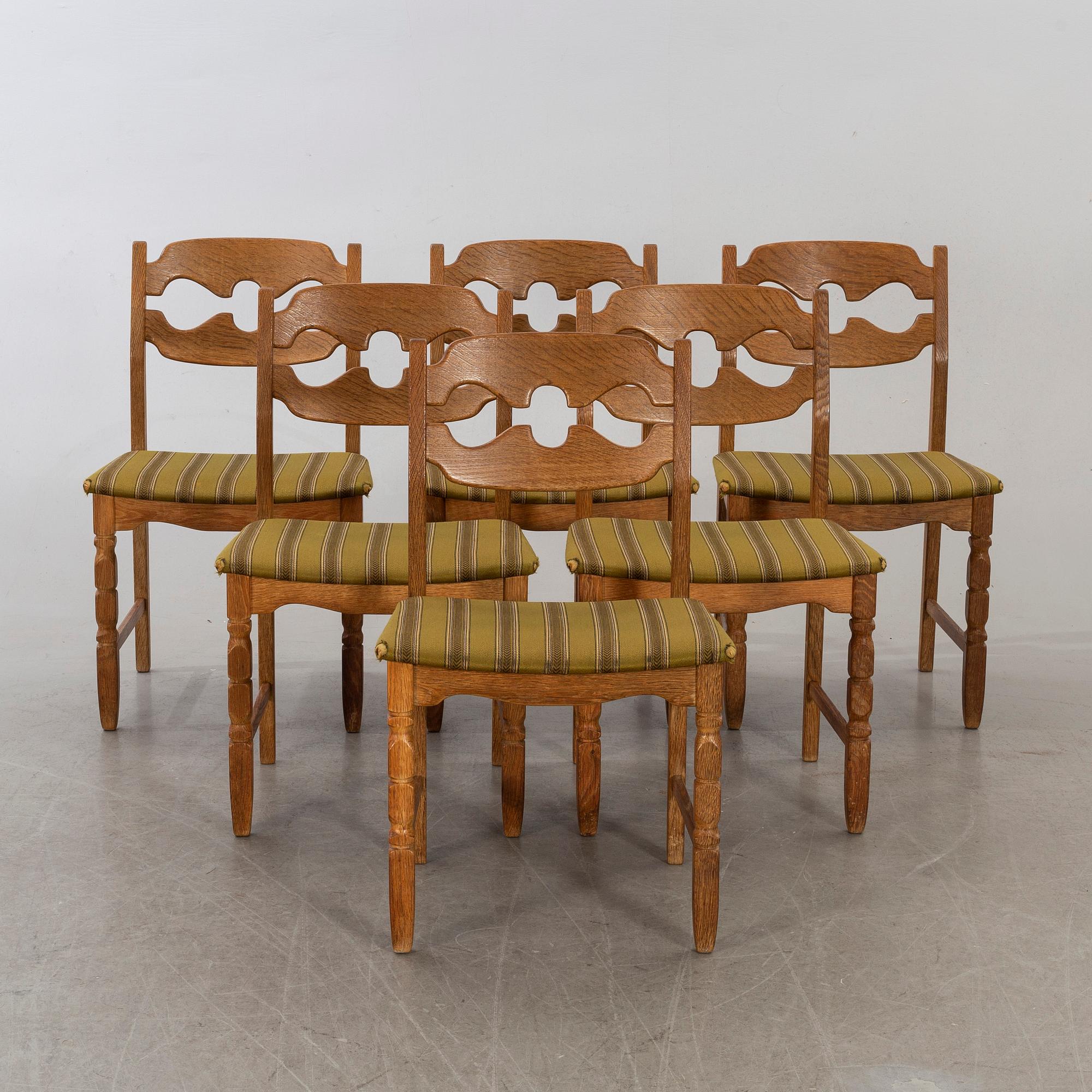 A set of six Danish Henning Kjaerulf chairs, second half of 20th century.