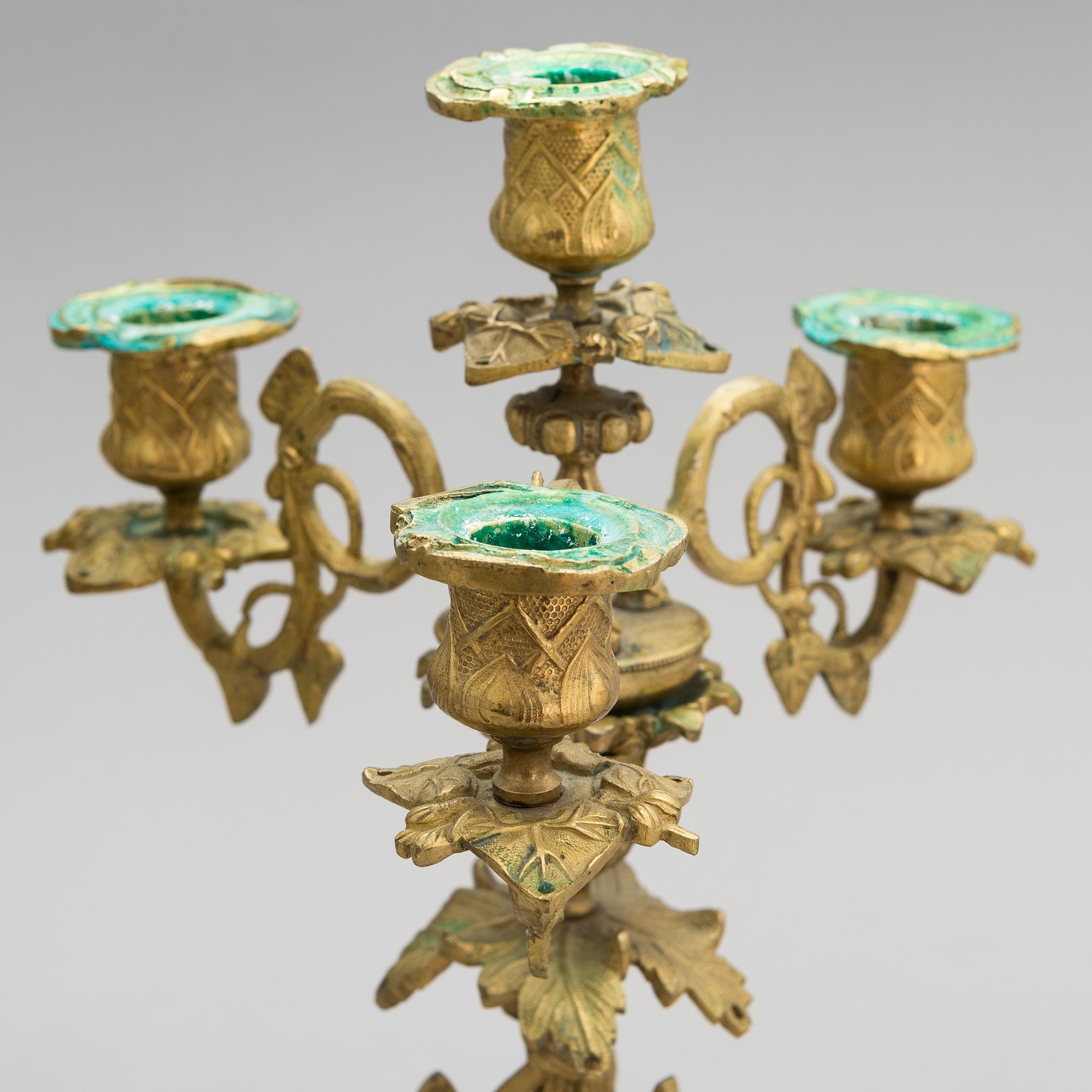 A pair of bronze candelabra from the latter half of the 19th Century.