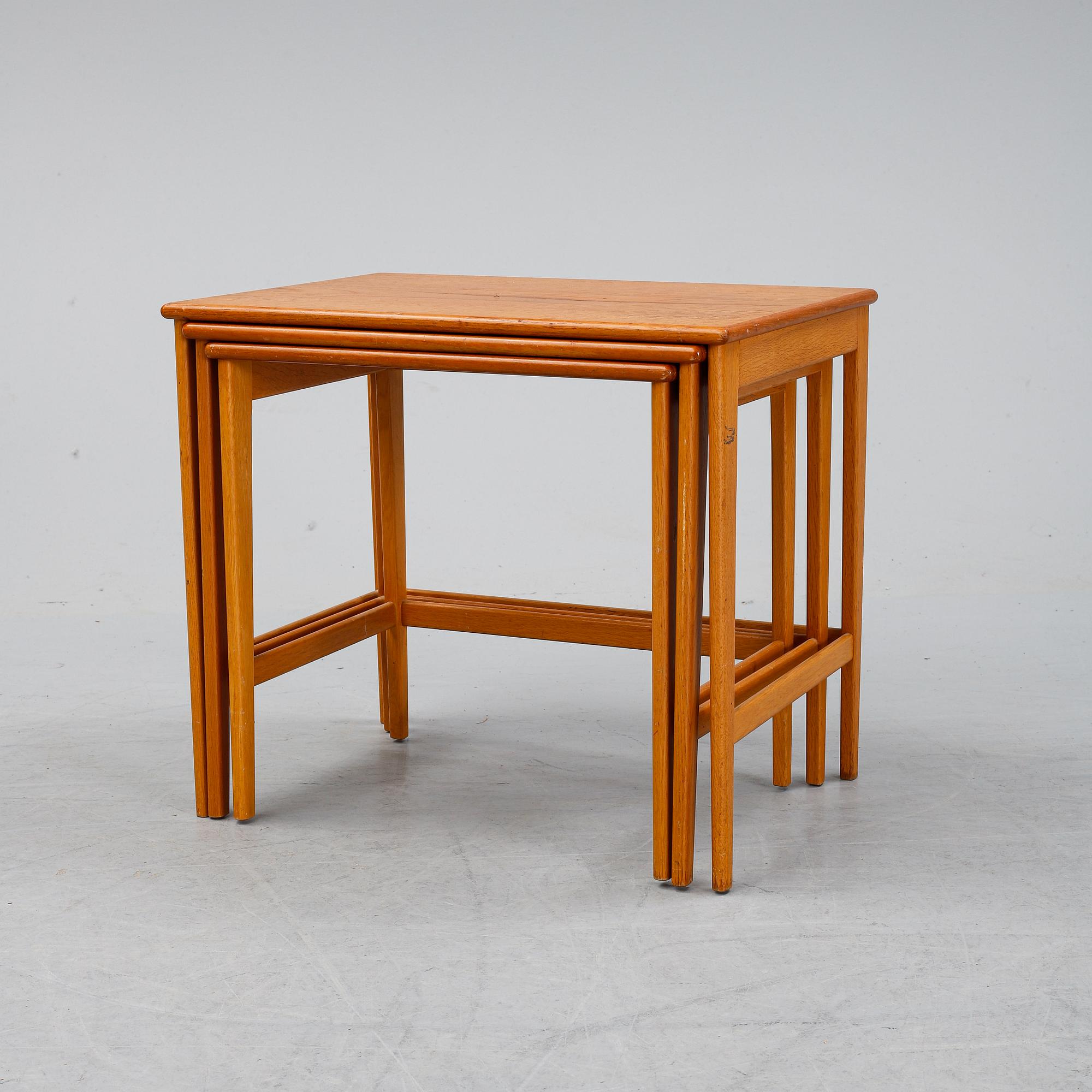 A 1950's teak nesting table.