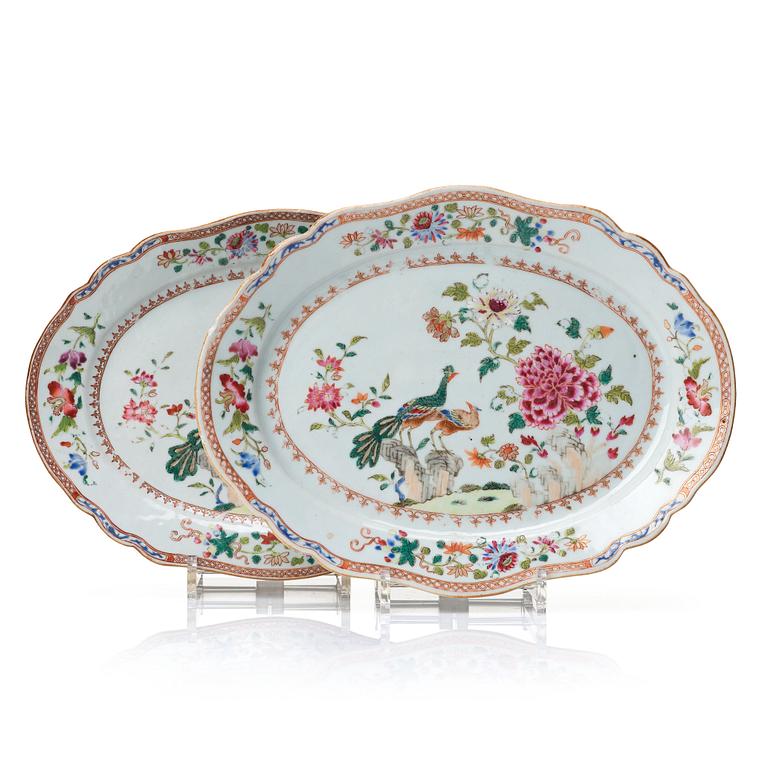 A pair of famille rose 'double peacock' serving dishes, Qing dynasty, Qianlong (1736-95).