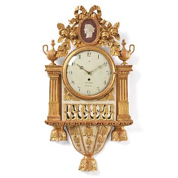 126. A late Gustavian giltwood cartel clock by J. Nyberg (master in Stockholm 1787-1801).
