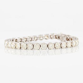Tennis bracelet, 18K white gold with brilliant-cut diamonds.