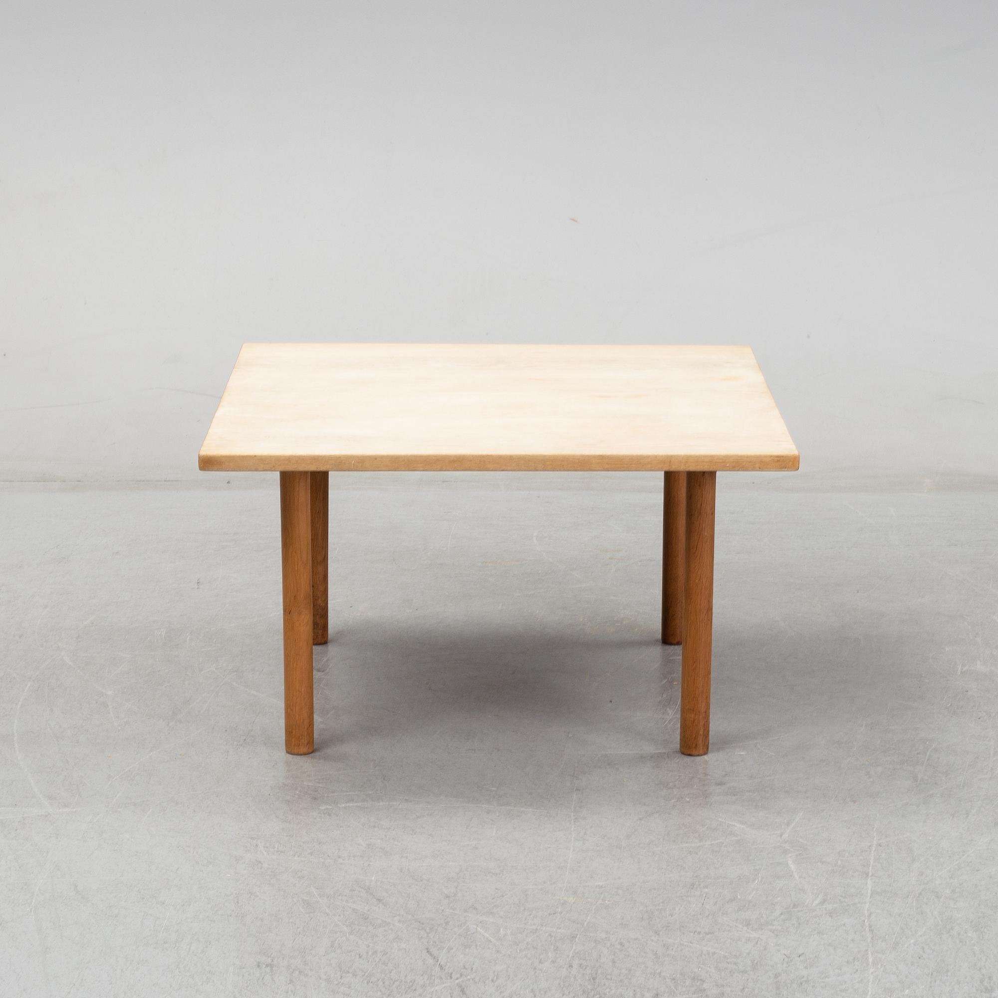 An oak coffee table by Hans J Wegner for Andreas Tuck.