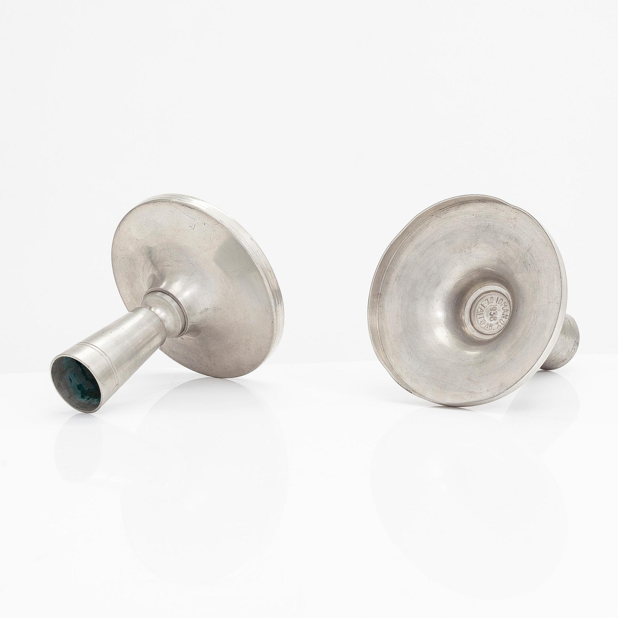 Paavo Tynell, two pairs of 1930s candlesticks for Taito.