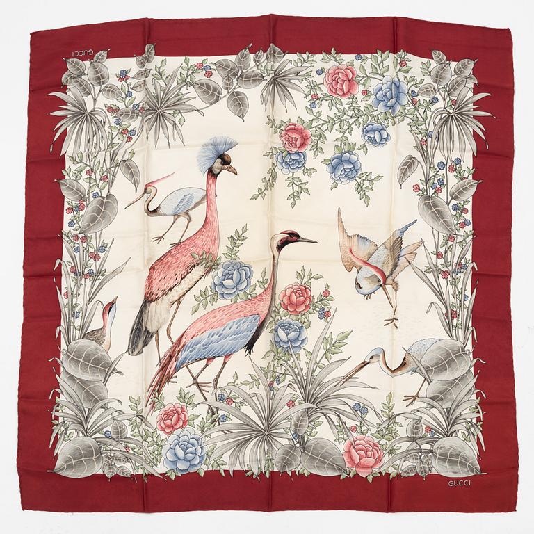 Gucci, a silk scarf.