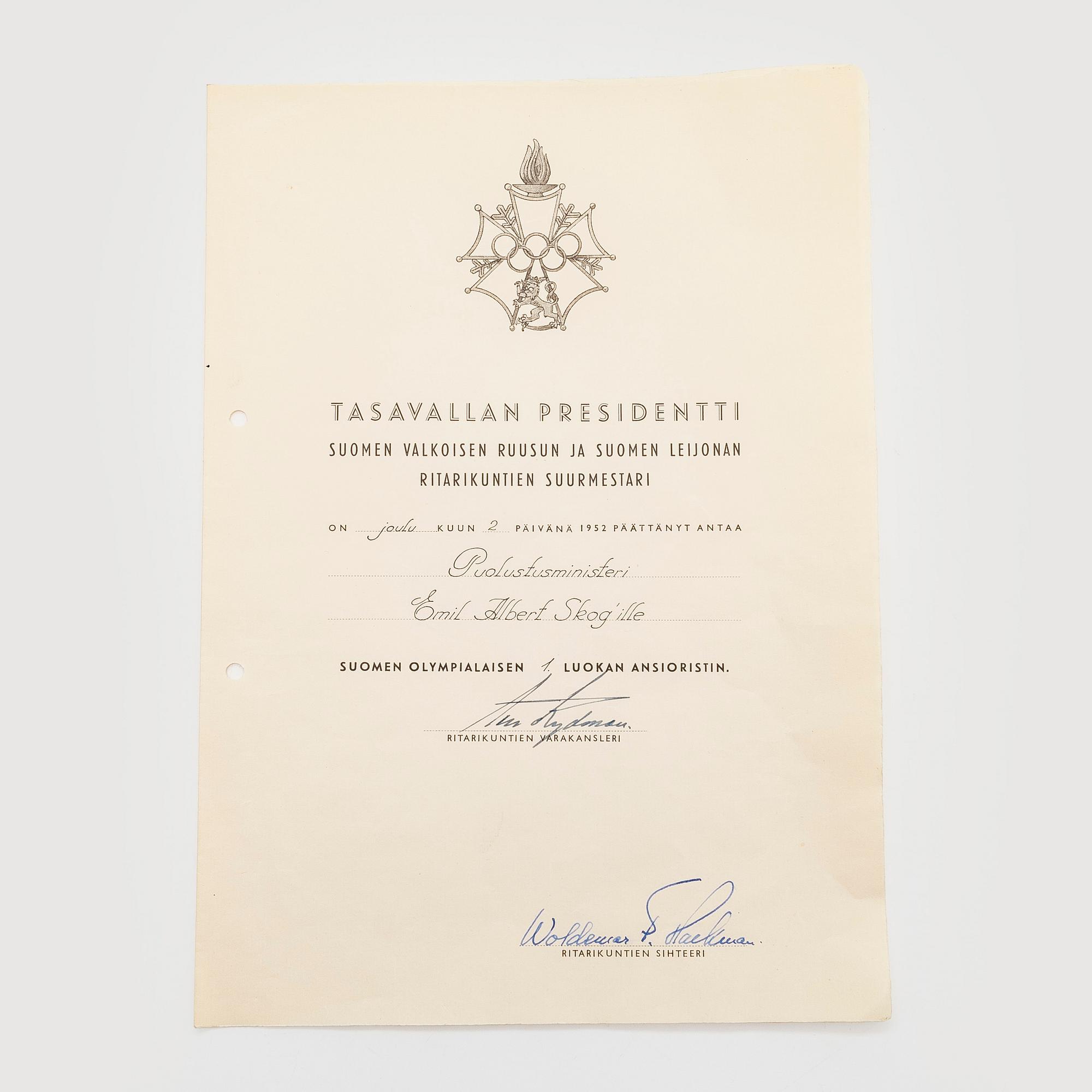 The Finnish olympic cross, 1st class, silver and enamel. Tillander, Helsinki and a Guest of Honor pin.