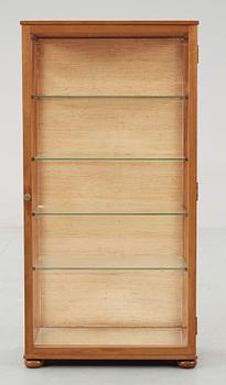 A Josef Frank mahogany and glass cabinet by Svenskt Tenn, model 649.