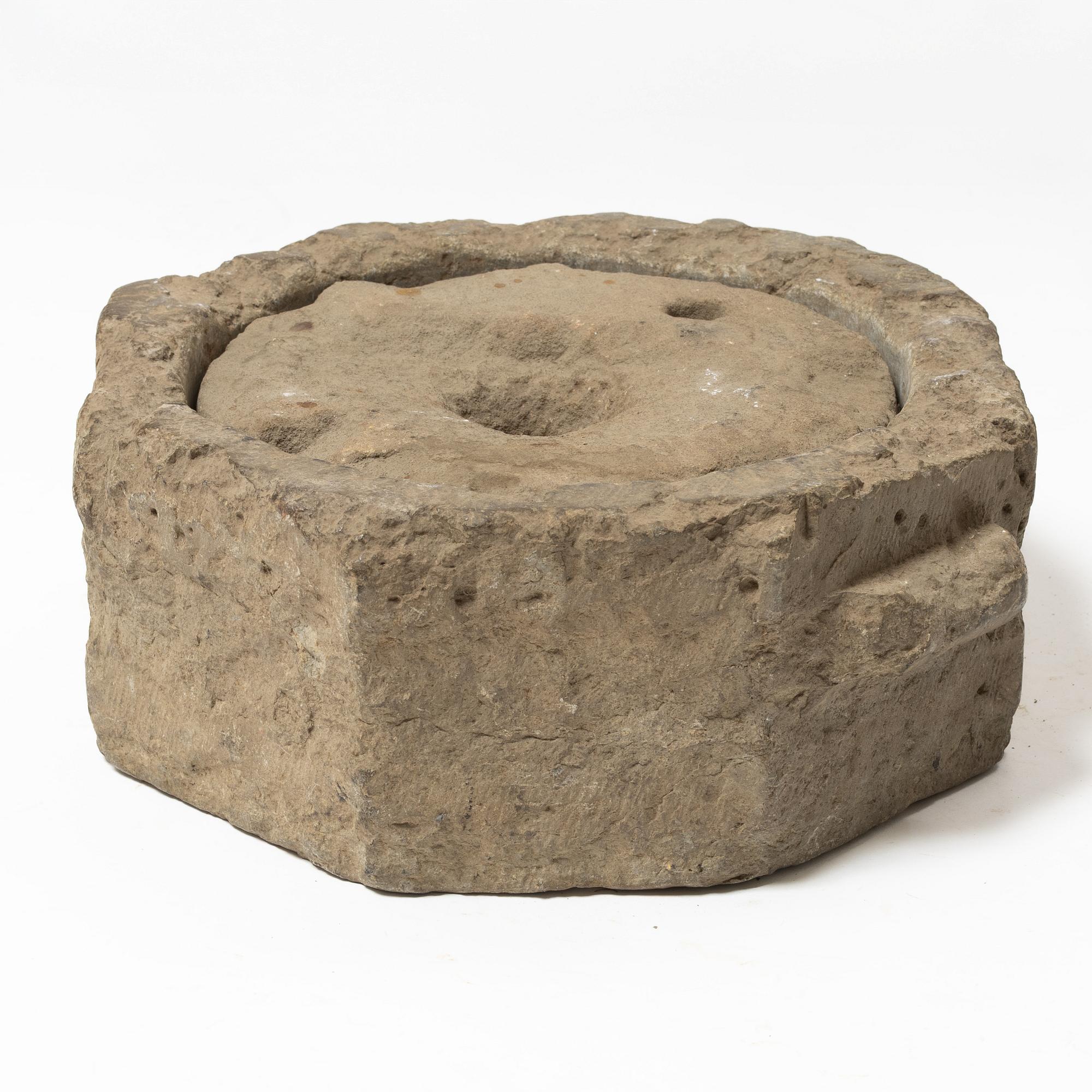 A Swedish grain mill, dated 1673.
