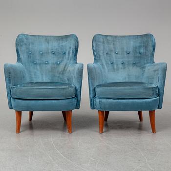 A pair of Swedish easy chairs.
