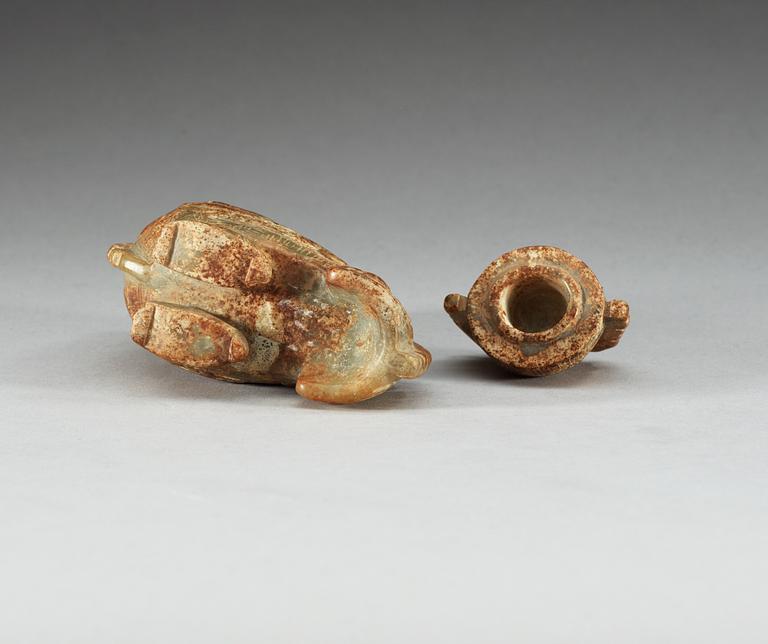 An archaistic nephrite bird shaped covered vessel.