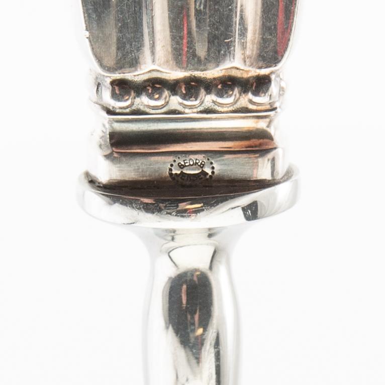 Johan Rohde, cheese slicer and bottle opener, sterling silver, "Konge/Acorn", Georg Jensen, Denmark, after 1945.