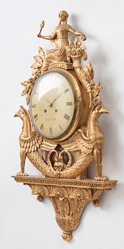 A Swedish Empire wall clock by G Undén.