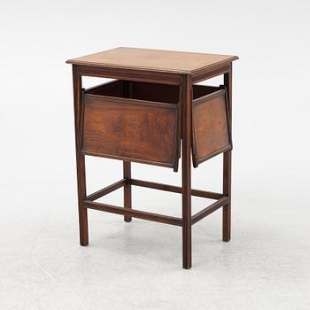 An English mahogany table, early 20th Century.