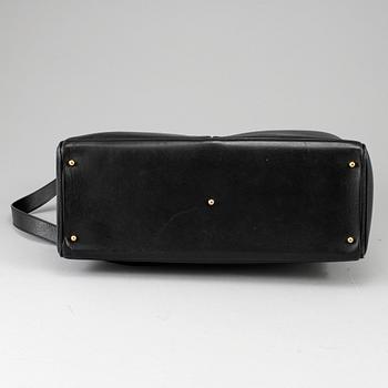 GUCCI, a leather bag/briefcase.