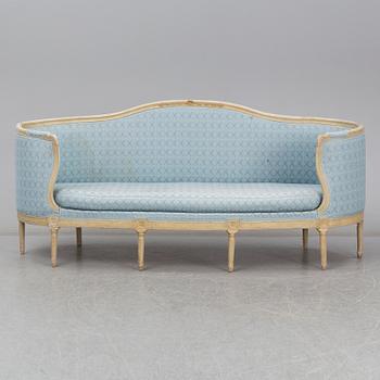 A Gustavian sofa, circa 1900.