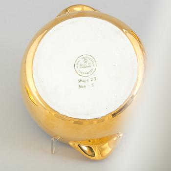A mixed lot of thirteen pieces porcelain mostly Royal Worcester gold lustre, 20th century.