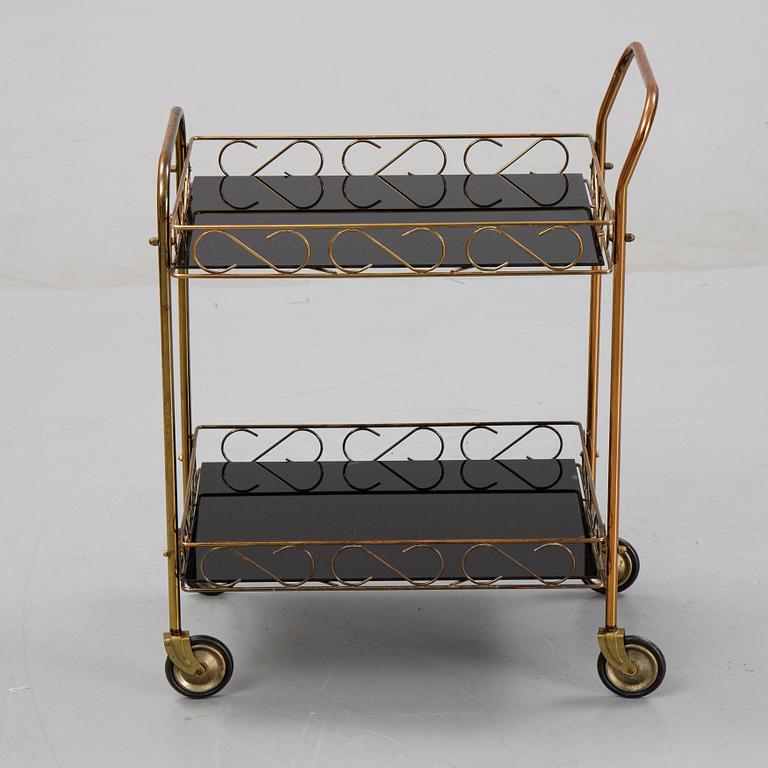 A brass and glass serving trolley, later part of the 20th Century.