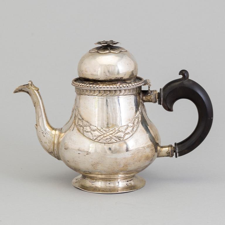 A late 18th century silver teapot.