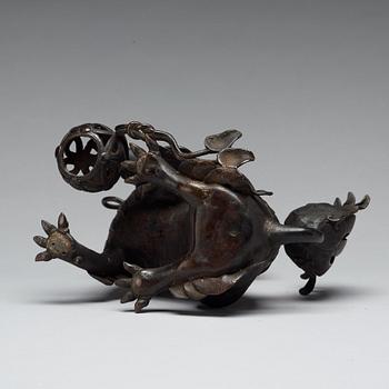 A bronze censer with cover in the shape of a Buddhist lion, Qing dynasty, 19th Century.