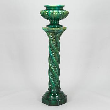A majolica flower pedestal with pot, around the turn of the century 1900.
