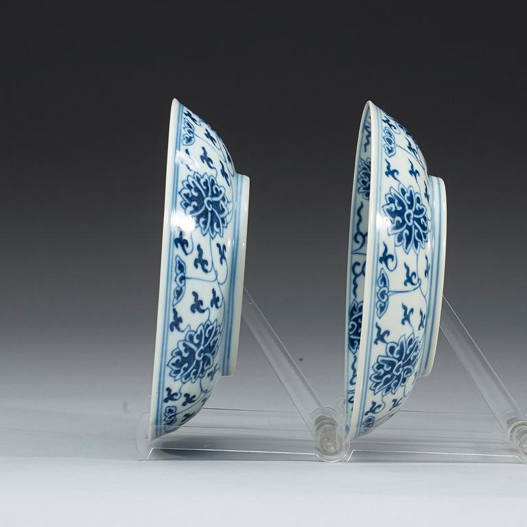 A pair of blue and white lotus dishes, Qing dynasty, Guangxu mark and of period (1874-1908).