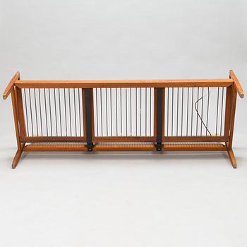 Hans Olsen, A teak and rattan sofa for Juul Kristensen, Denmark, late 1950s.