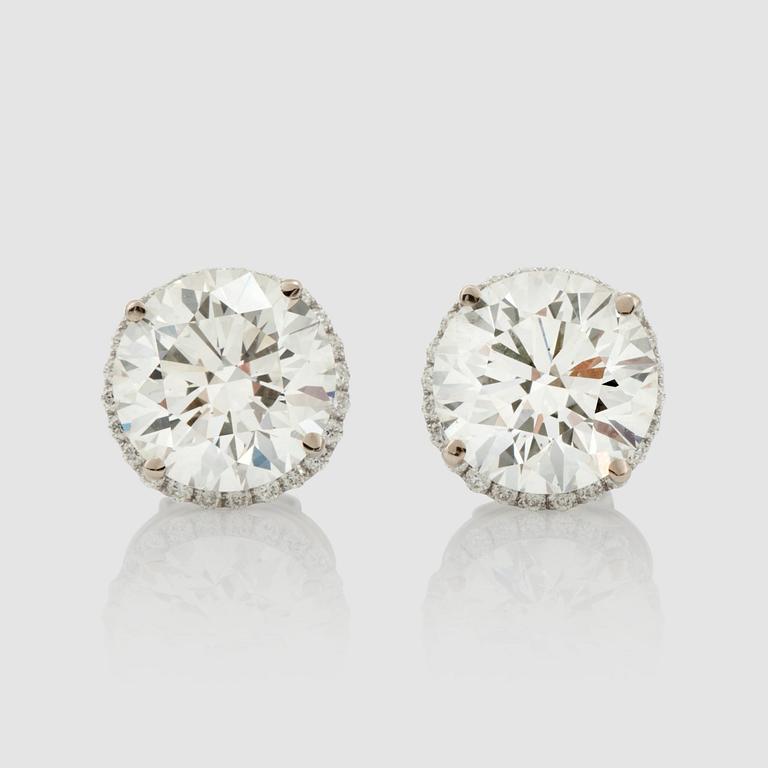 A pair of brilliant-cut diamond, 4.10 cts and 4.12 cts, earrings.