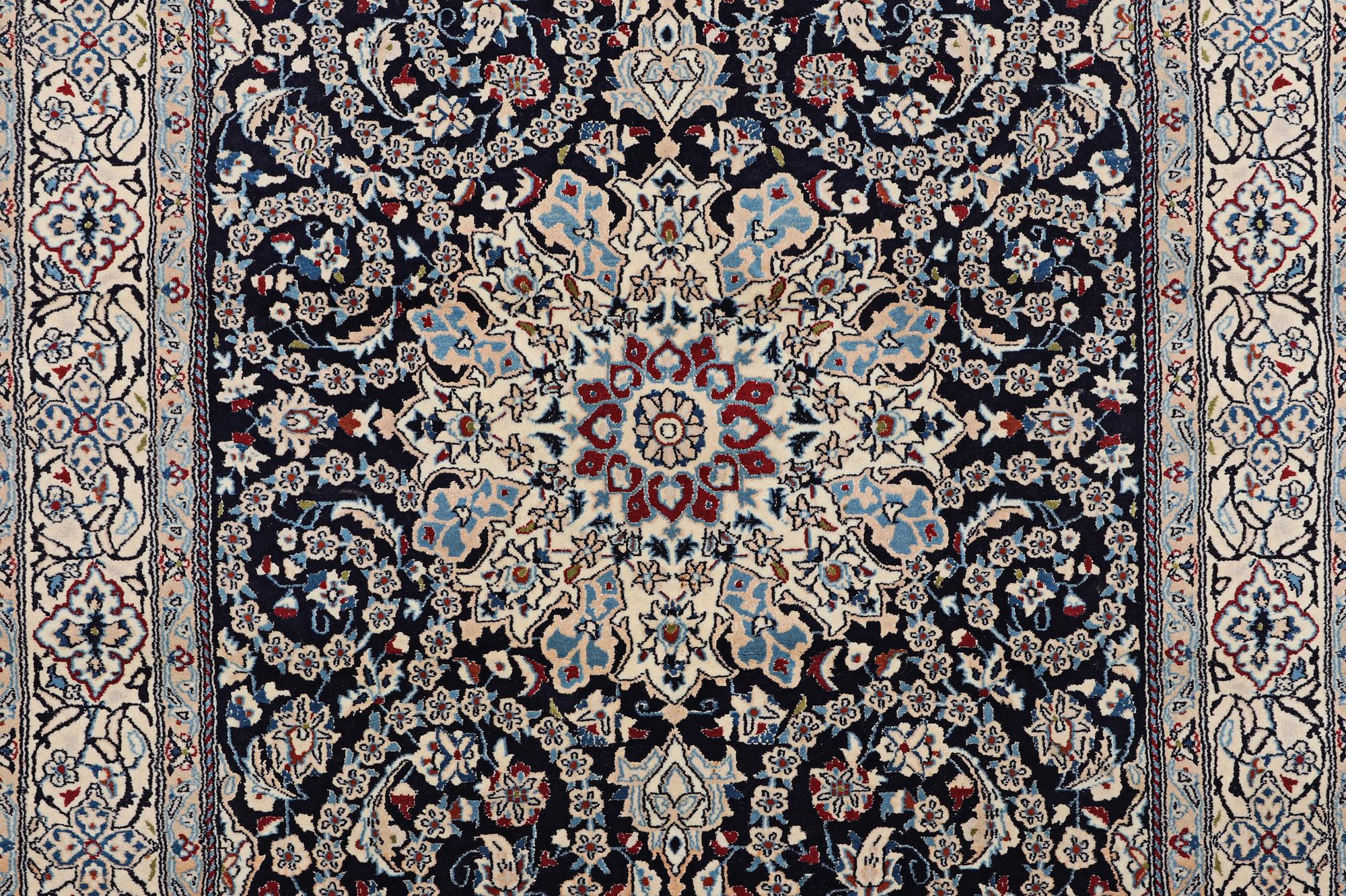 A carpet, Nain, part silk, 9 Laa, ca 295 x 197 cm.