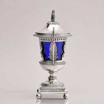 Lockurna, silver med blå glasinsats, Frankrike 1800-talets början.