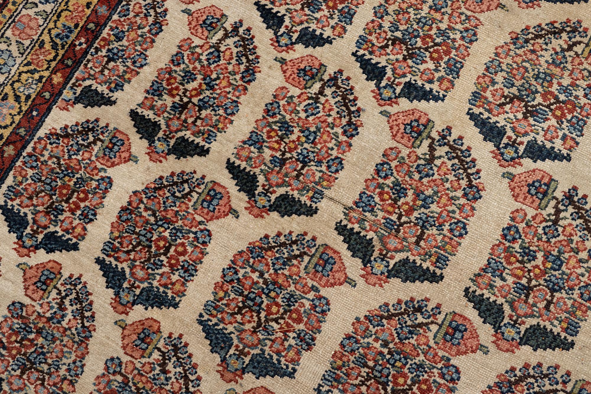 A Bakhtiari carpet, signed, c. 580 x 212 cm.