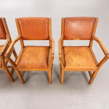 A set of four 1970:s Tage Poulsen Daumiller oak and leather armchairs for GM Möbler Denmark.