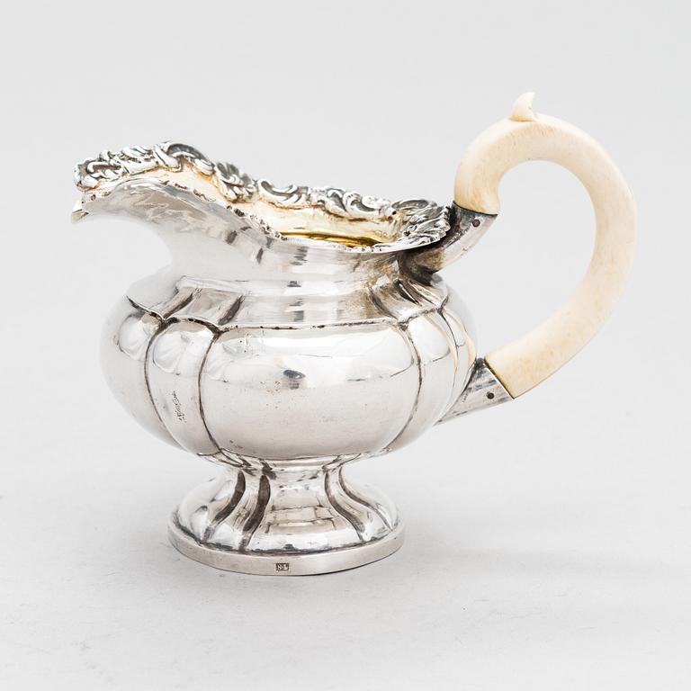 A Russian silver cream jug, Moscow, 1825-29. Unidentified maker's mark. Assay master Nikolay Dubrovin.