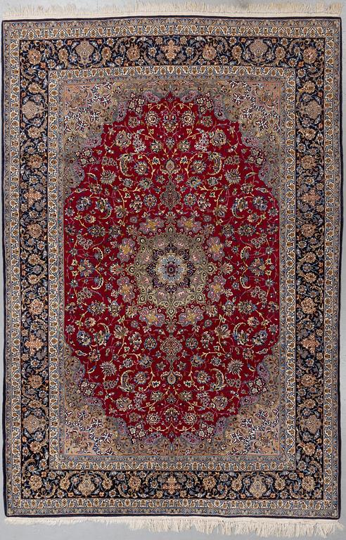 A carpet, Old Esfahan, part silk, ca 298,5 x 203 cm.