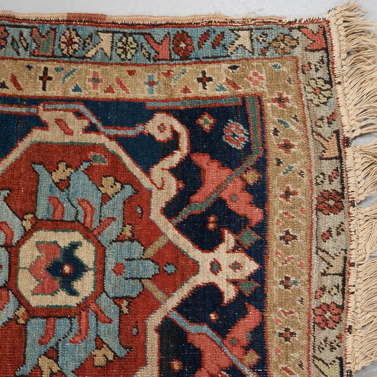 A CARPET, an antique Heriz, 476,5 x 344,5 cm.