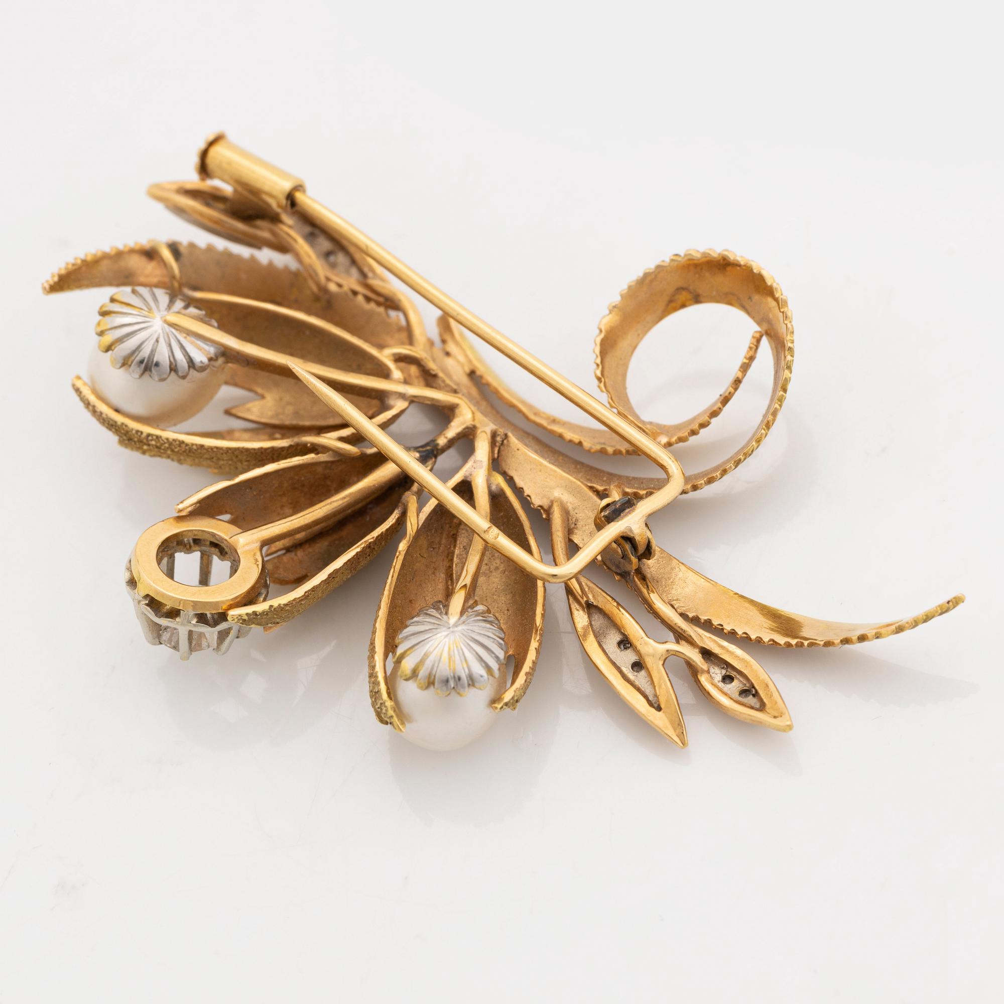 Pearl and diamond brooch.