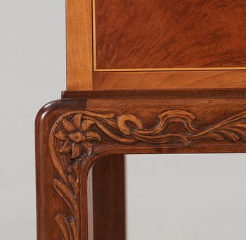 A Georg Johansson cabinet with inlays of several exotic woods, Gothenburg Sweden 1938.